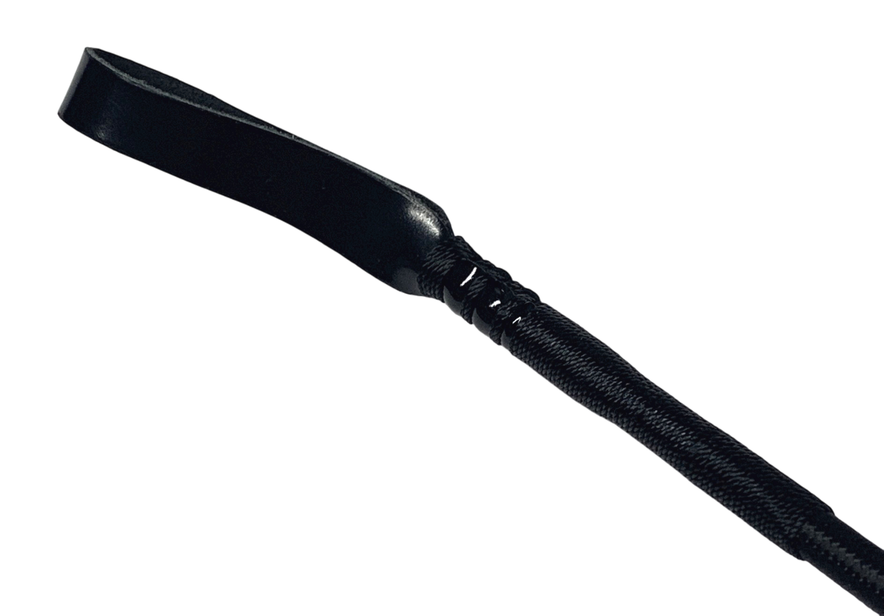 Riding crop with leather flap
