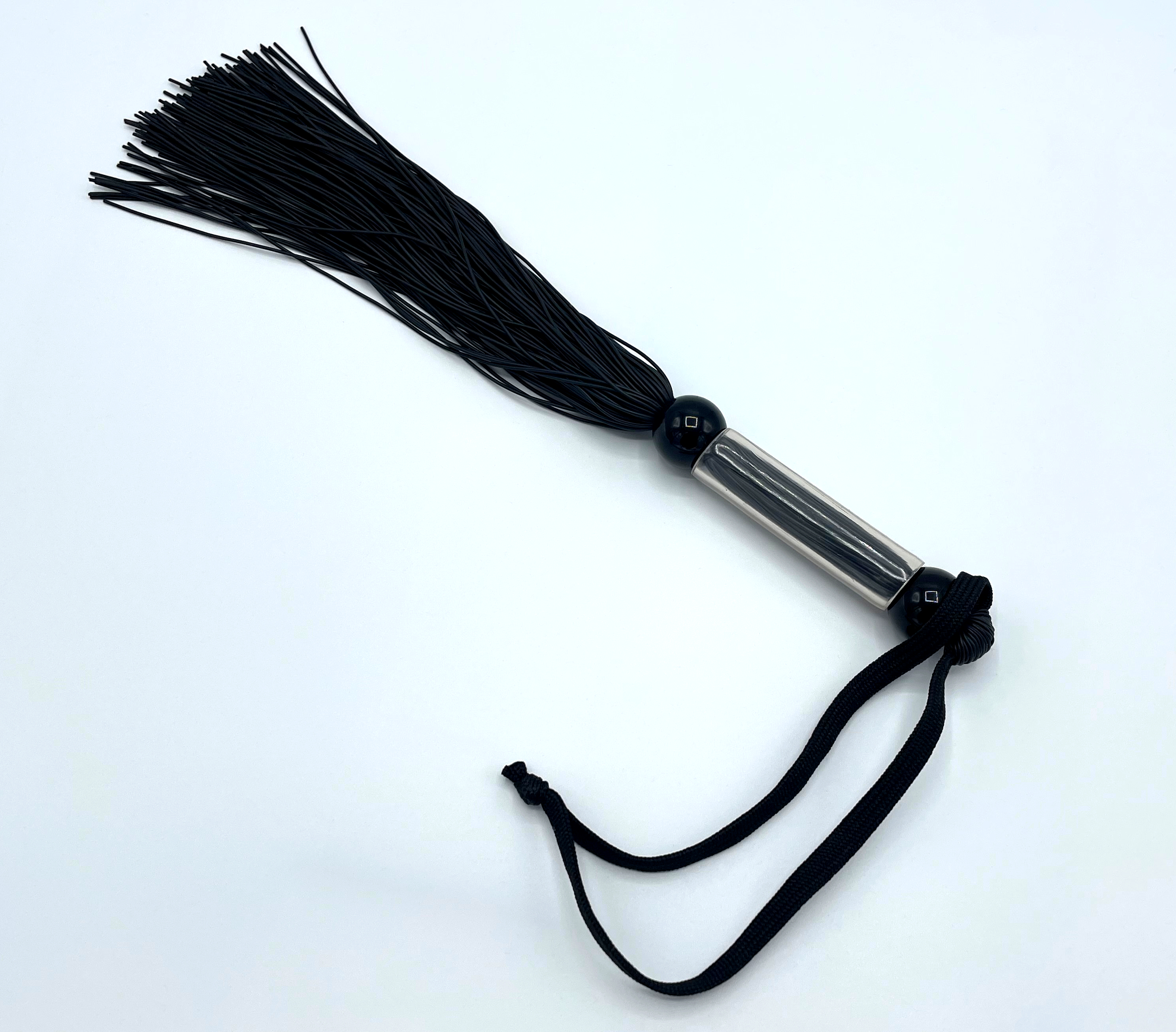 Genital whip with silicone straps