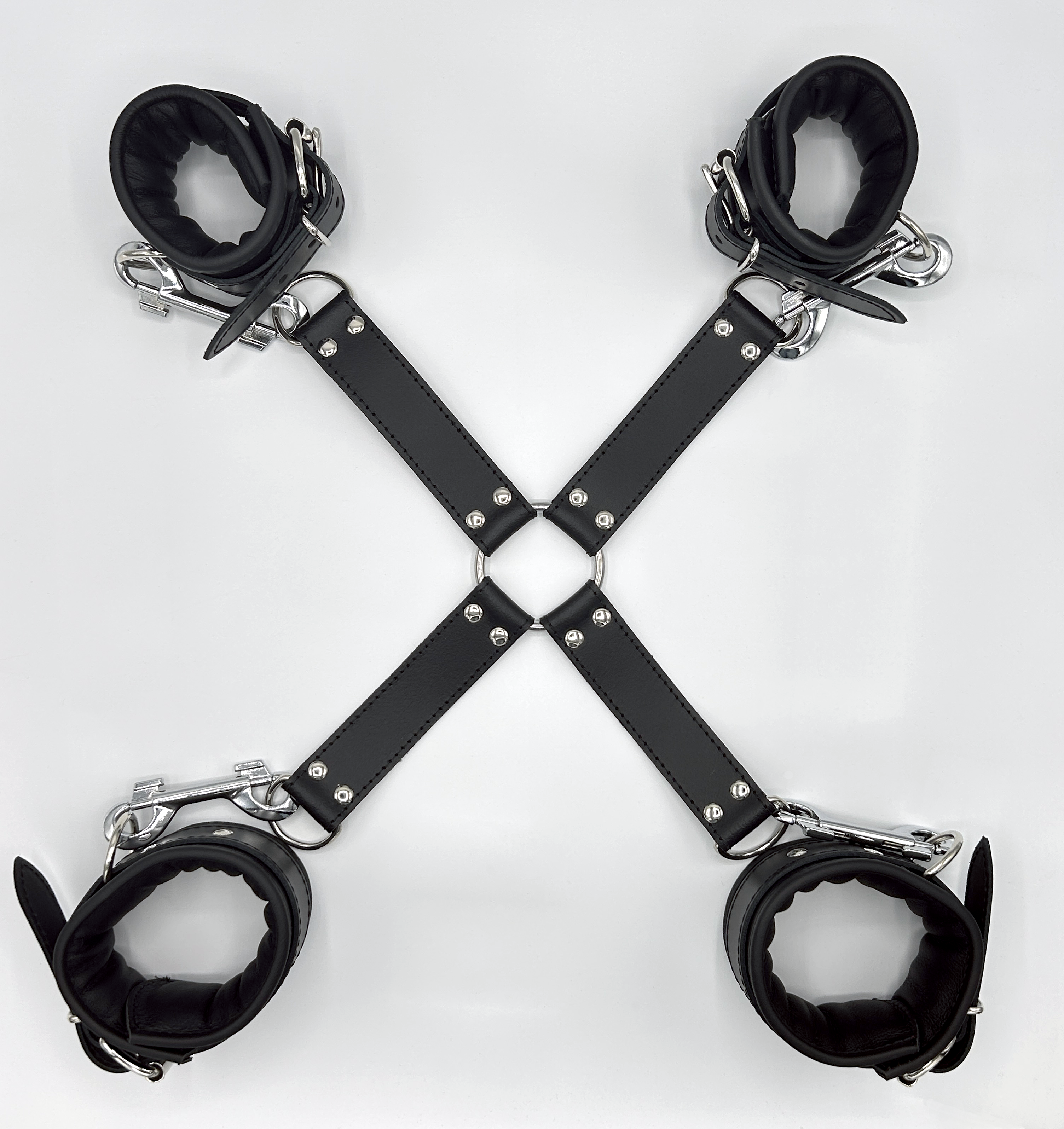 Set of handcuffs and leg irons with hogtie and carabiner hook