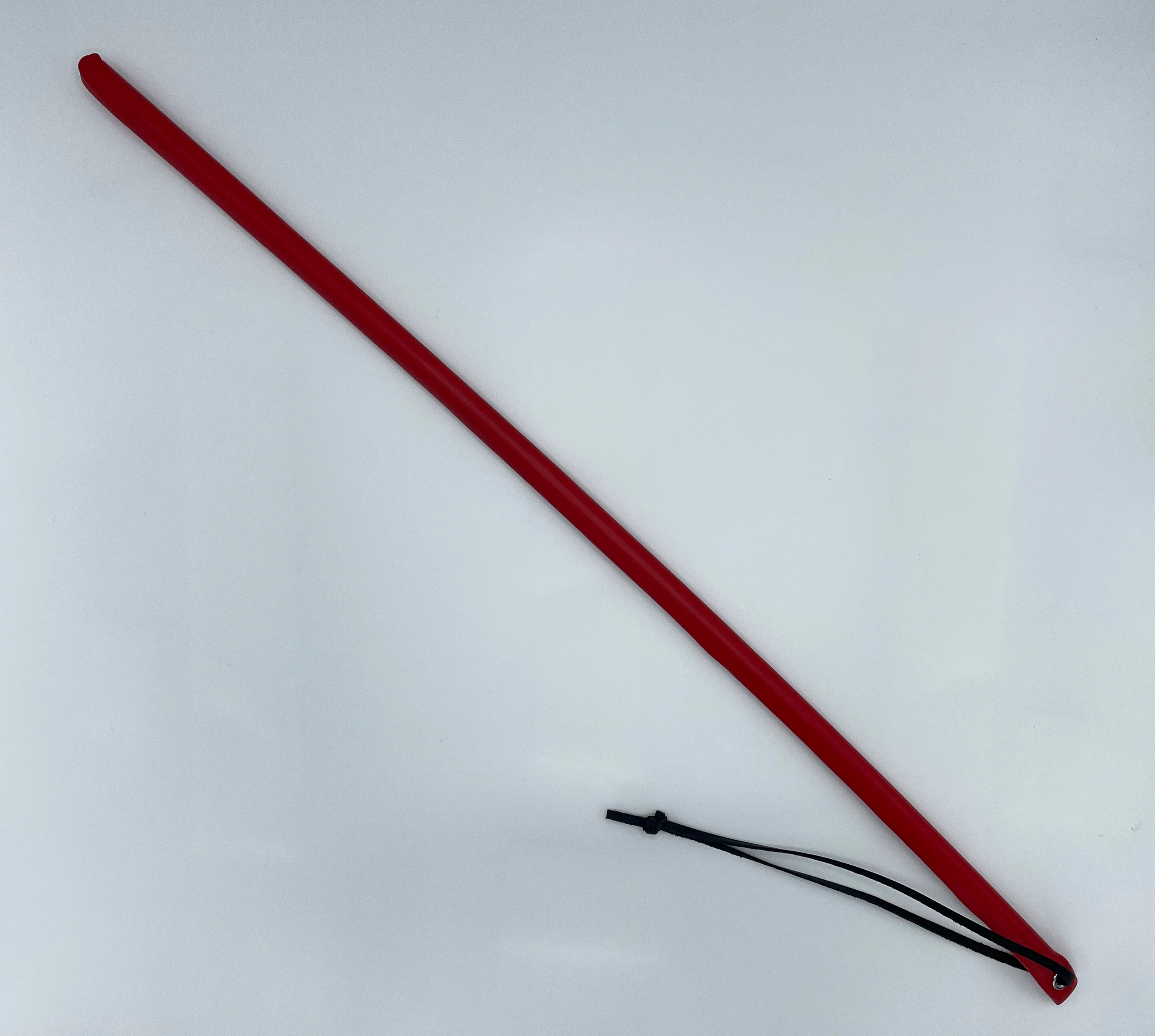 leather covered stick with wrist strap