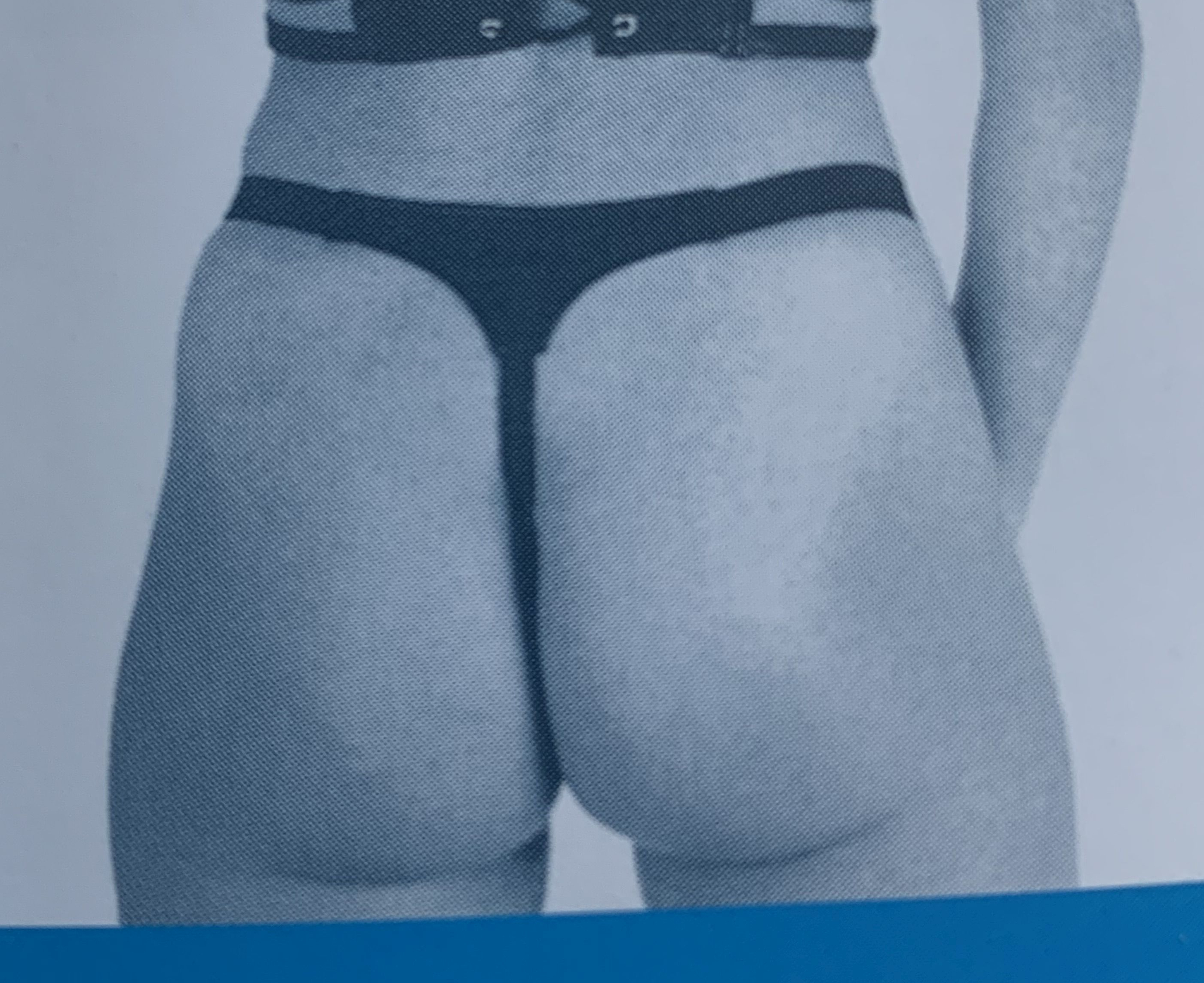 Women's thong made of perforated leather