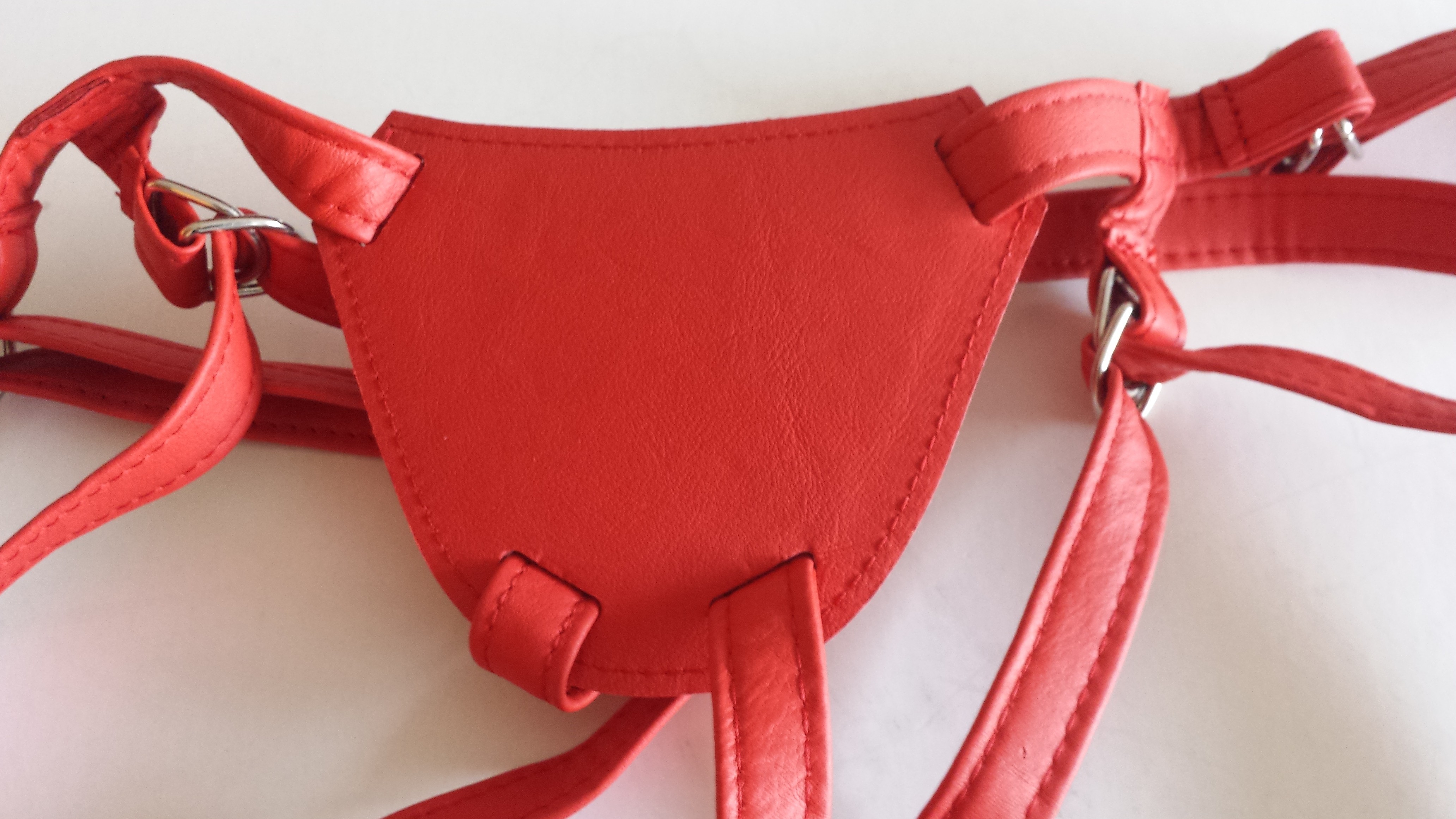 Dildo harness strap on red