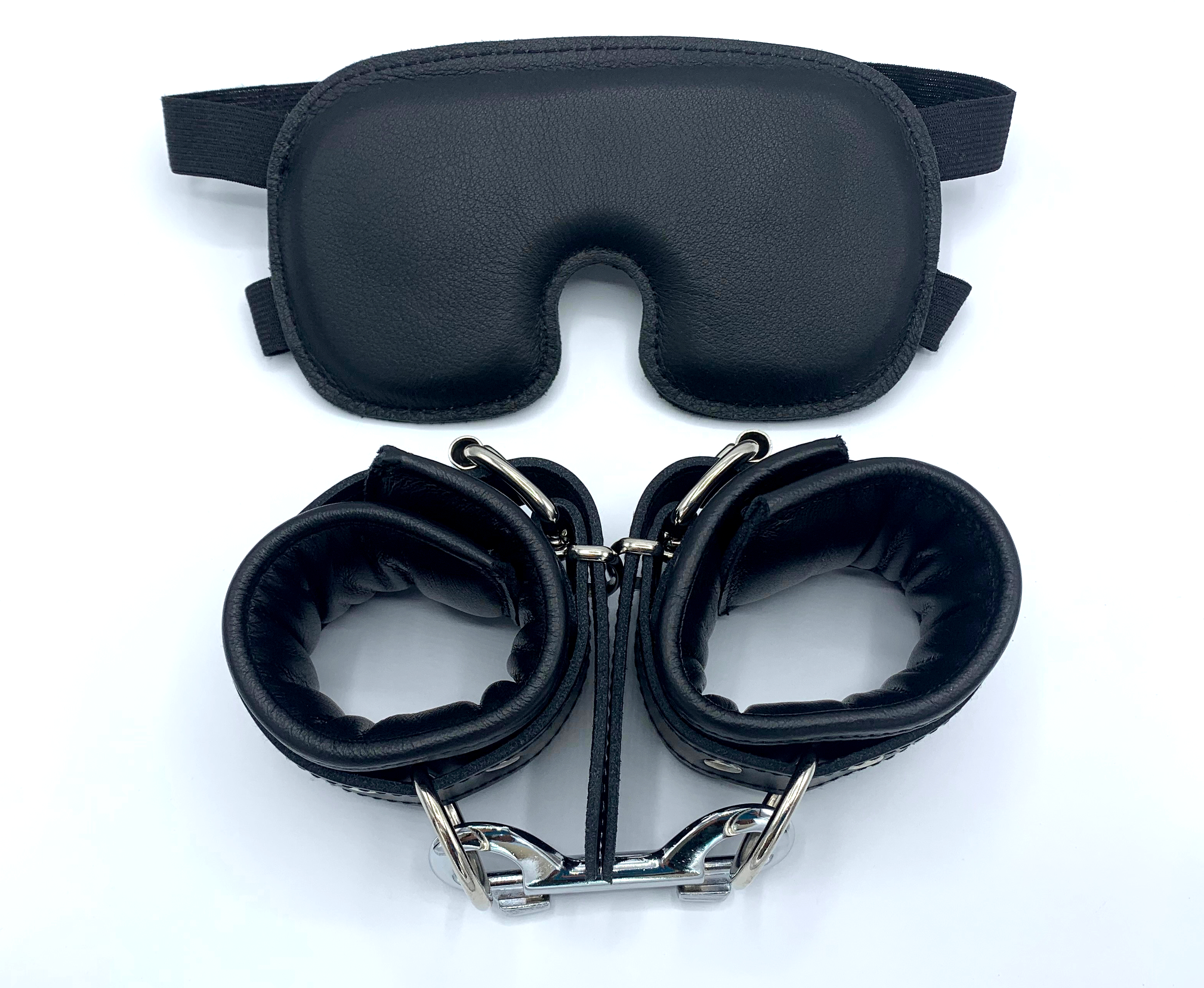 Set of handcuffs and eye mask