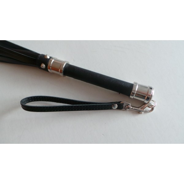 Whip with metal accessories